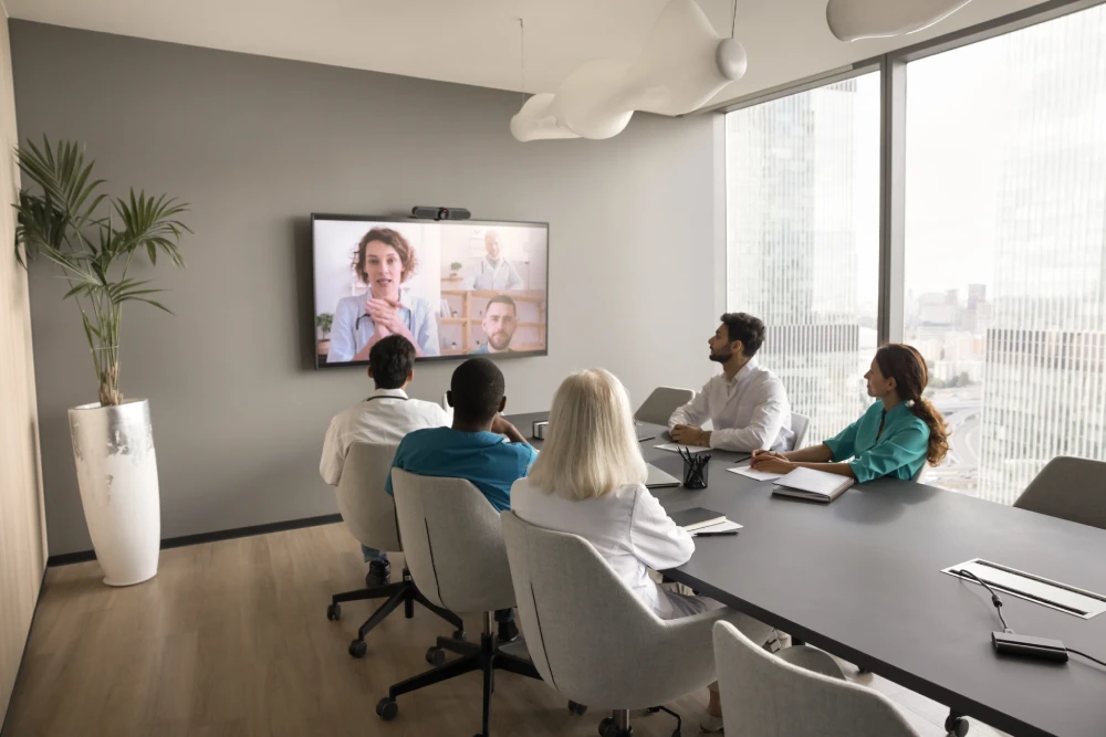 virtual meeting in conference room